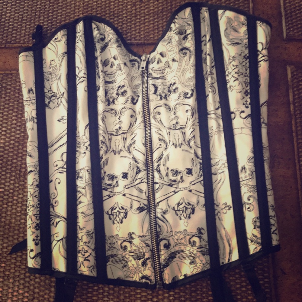 Black and white zip up skull corset.